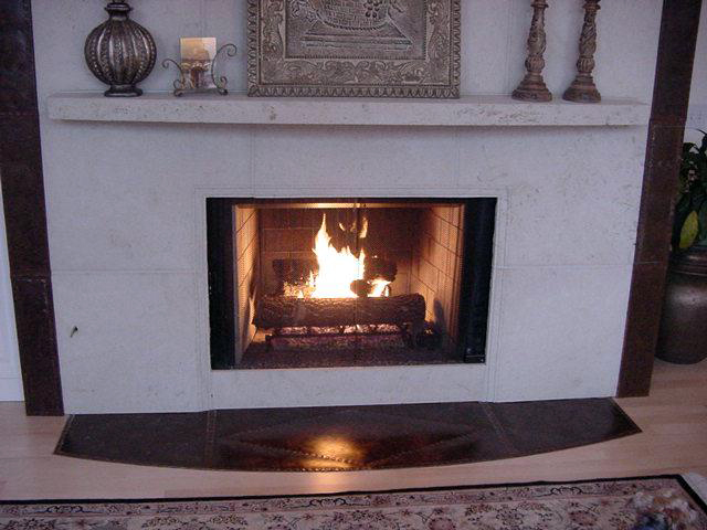 Germaine Fireplace Original design by Dale Johnson Kansas Limestone, Bronze 12' x 8' x 3'