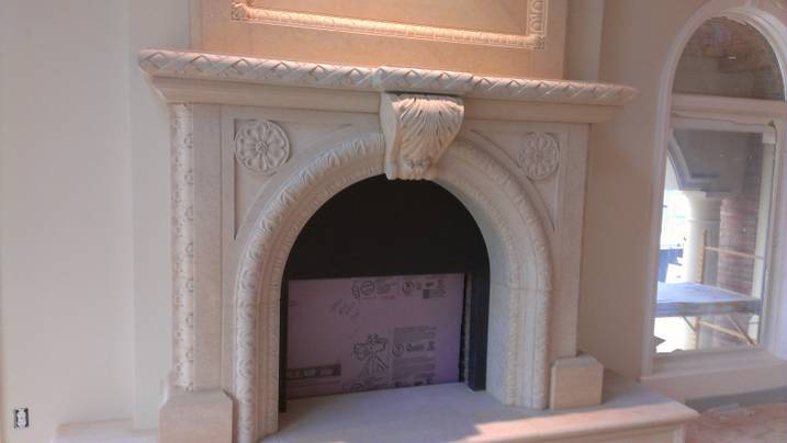 Karlsson Fireplace Mankato Limestone Design by Erik Karlsson Details carved by Dale Johnson 14' x 9' x 2'