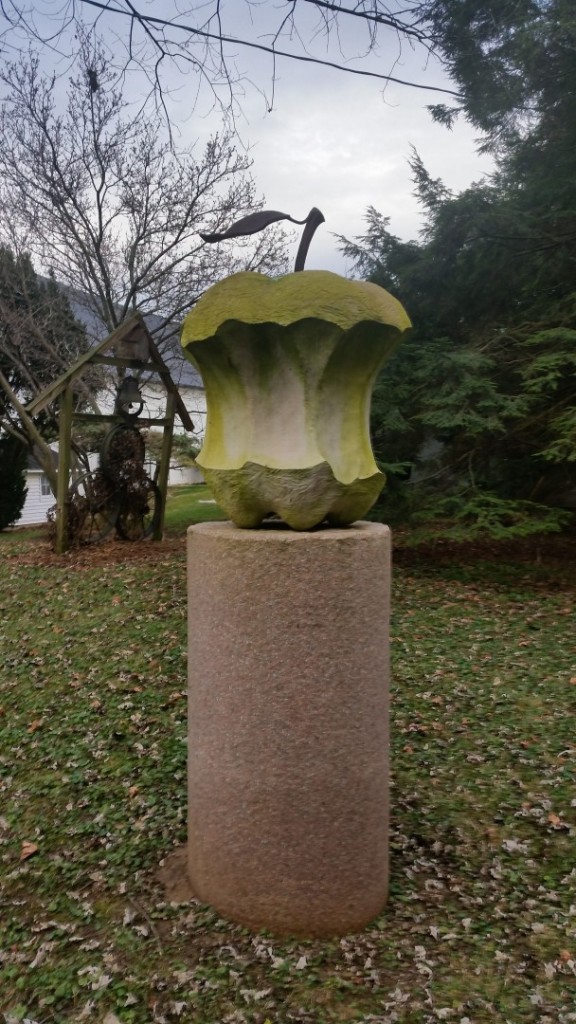 Although the missing foliage makes for a chilly photo, here the forged steel stem and leaf by blacksmith Mark Bokenkamp can be clearly seen.